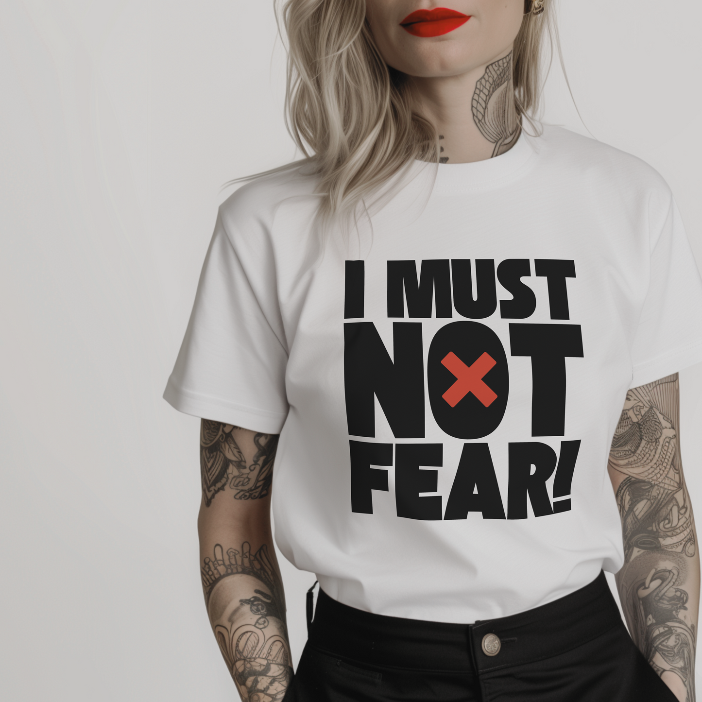 Women’s minimalist t-shirt with the quote 'I must not fear!' in a simple design and white color.