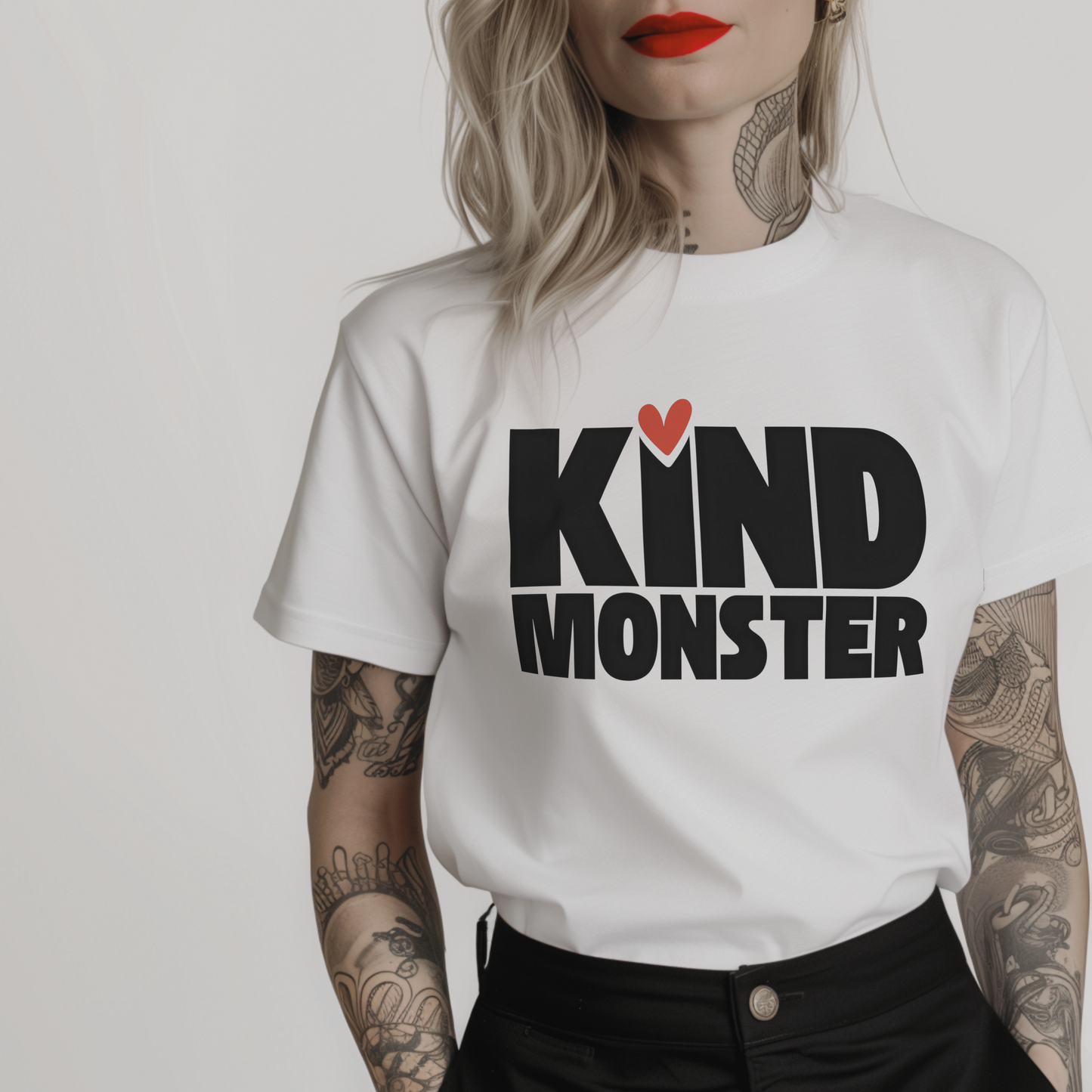 Women’s minimalist t-shirt with the quote 'KIND MONSTER' in a simple design and white color.