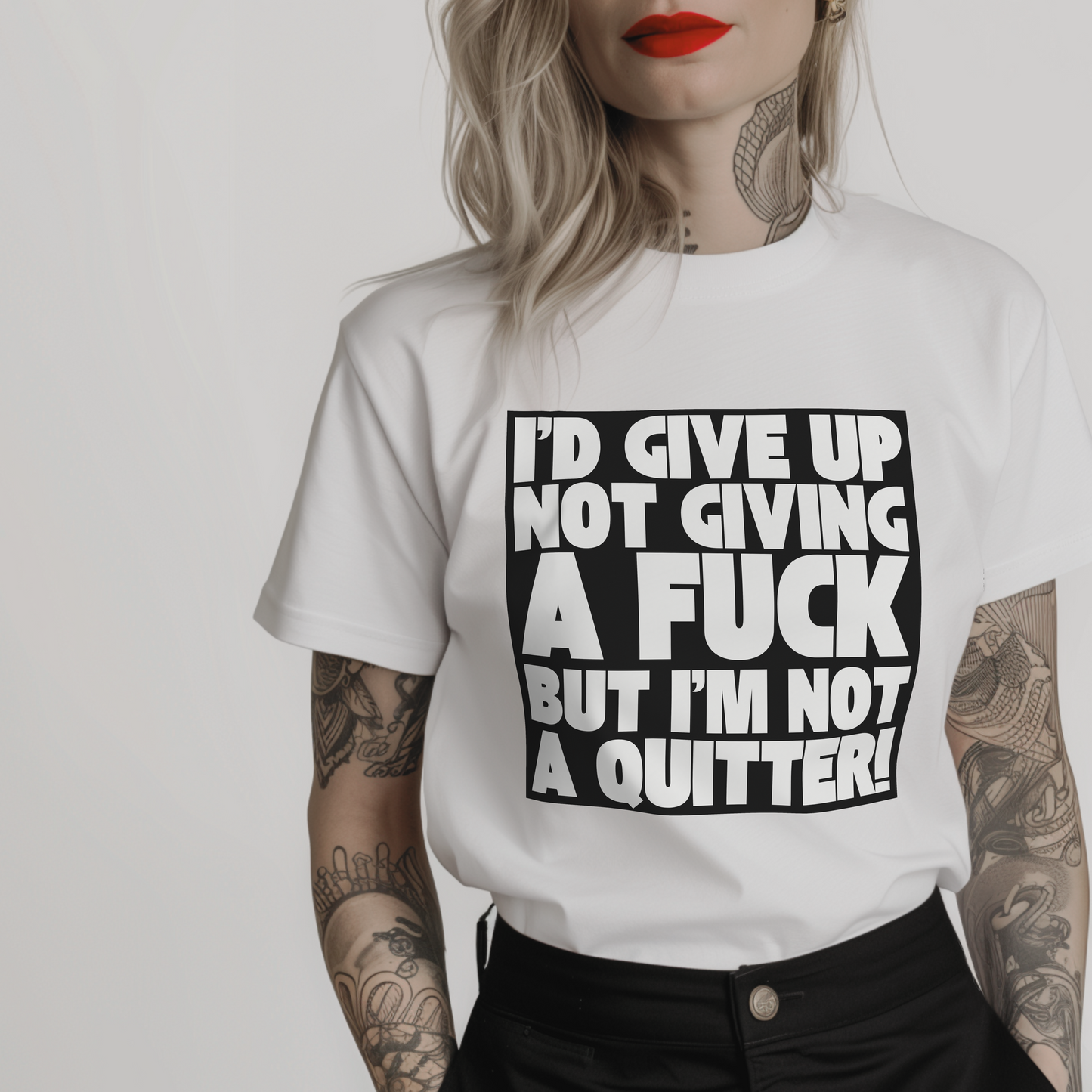 Women’s minimalist t-shirt with the quote 'I'd give up not giving a fuck but I'm not a quitter!' in a simple design and white color.