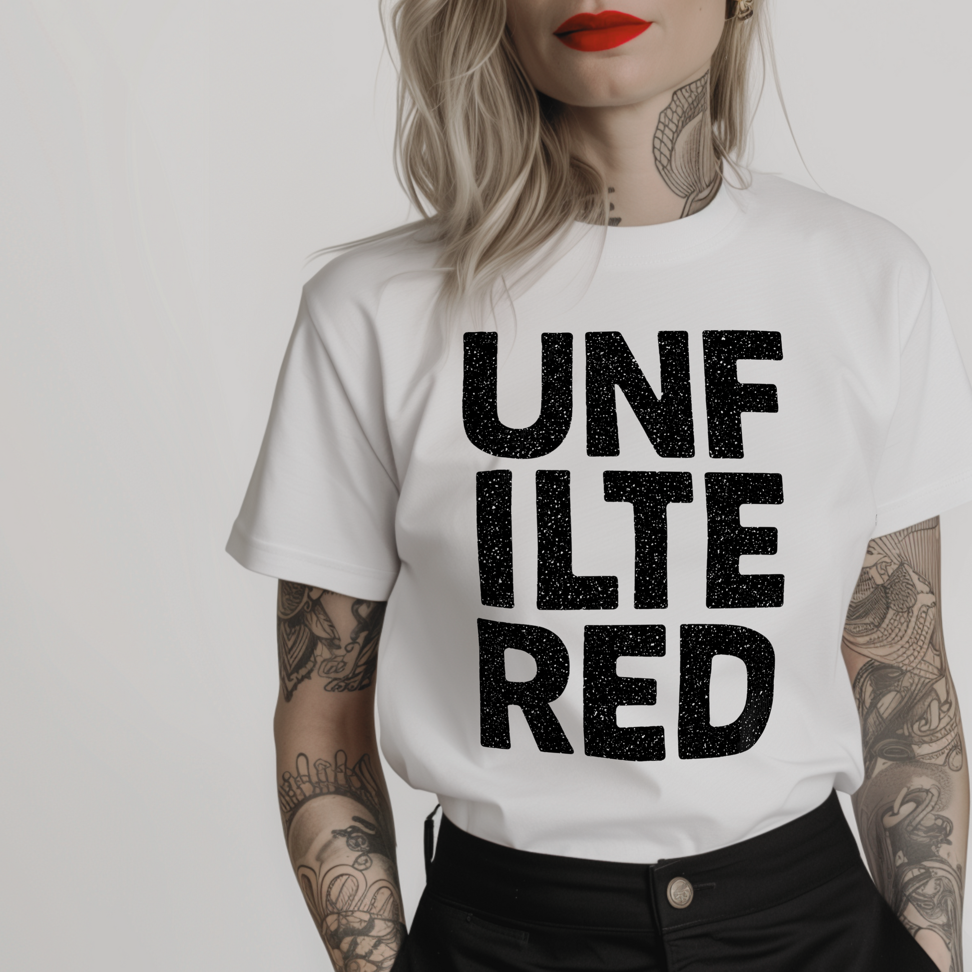 a white t-shirt for alpha women with 'UNFILTERED' text on a in bold black font with tiny speckles