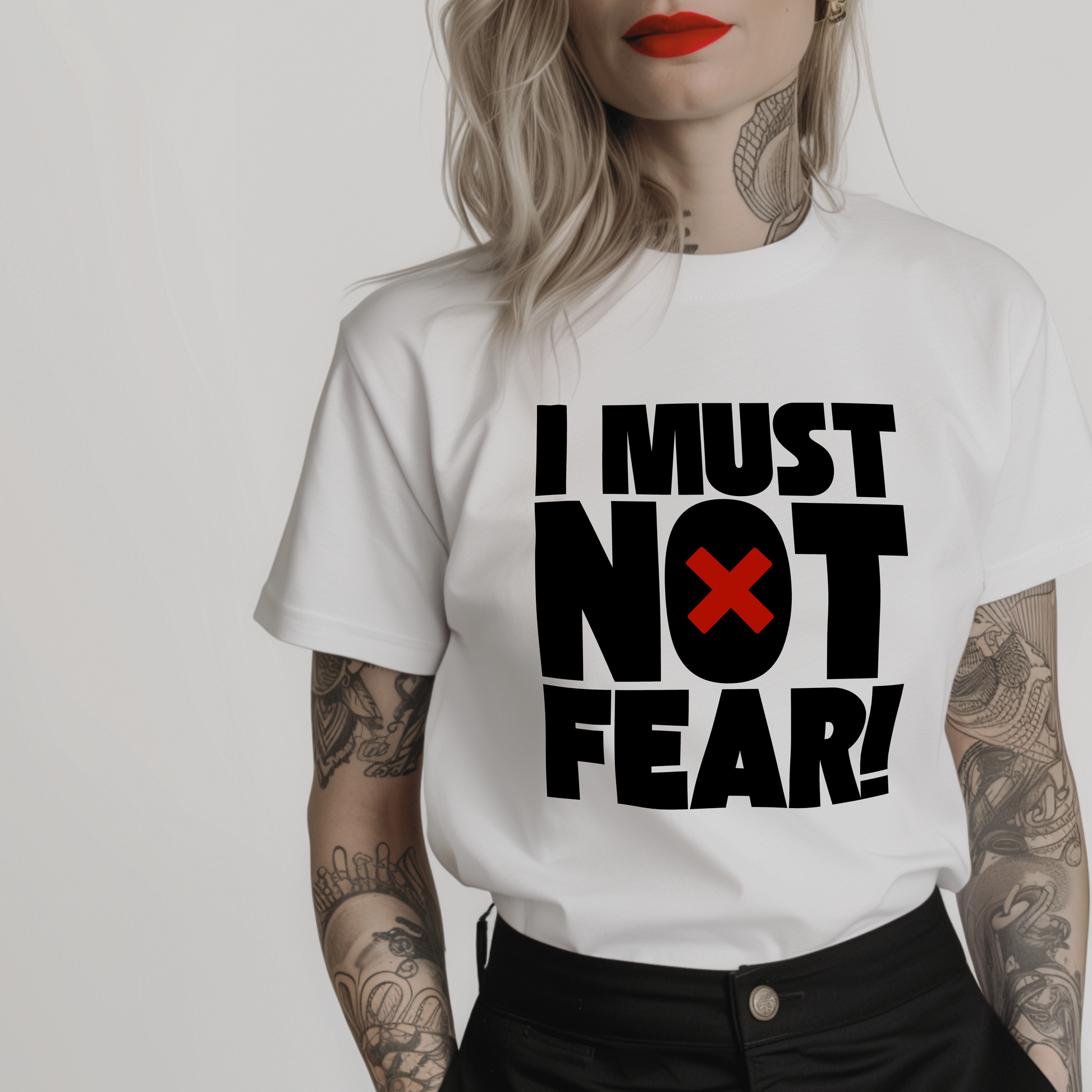litany against fear white tshirt for women featuring the bold text "I must not fear" in black and red