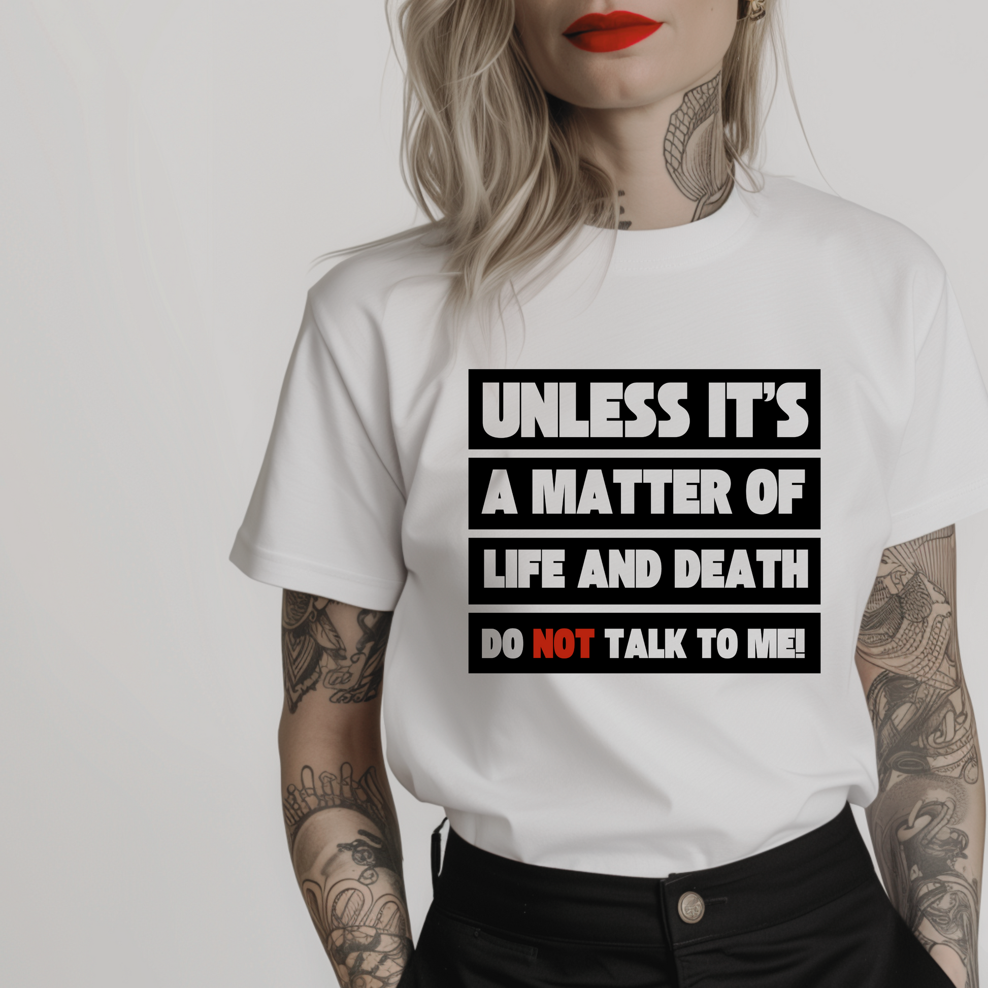 Women’s minimalist t-shirt with the quote 'Unless it's a matter of life and death do not talk to me!' in a simple design and white color.