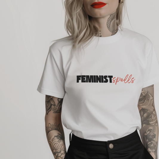 Women’s minimalist t-shirt with the feminist quote 'FEMINISTspells' in a simple design and white color.