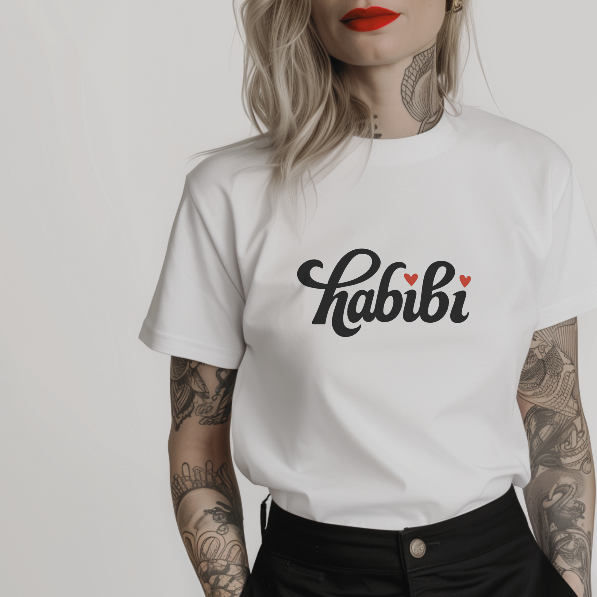 white tshirt for women with the arabic word habibi and two small hearts instead of dots