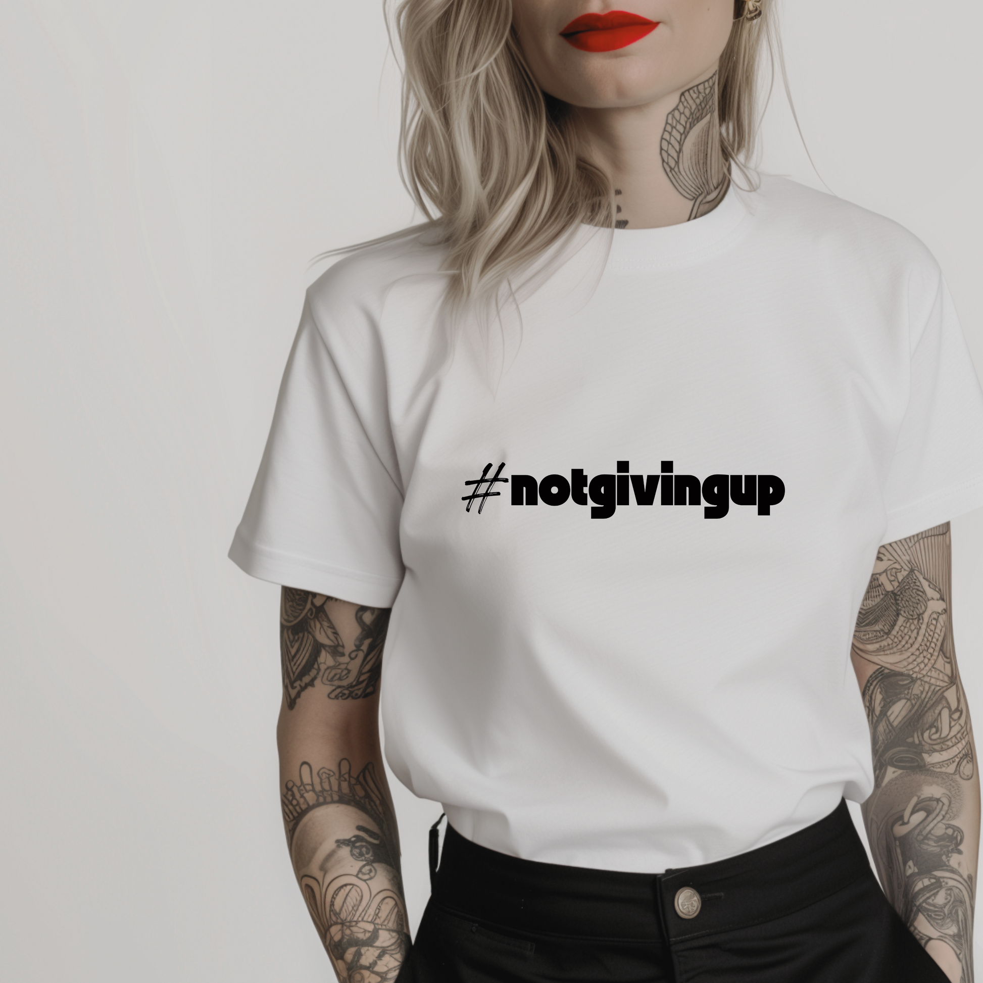 Women’s minimalist t-shirt with the hashtag #notgivingup in a simple design and white color.