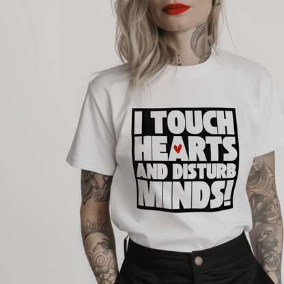 white feminist t-shirt with text 'I touch hearts and disturb minds' in big bold font