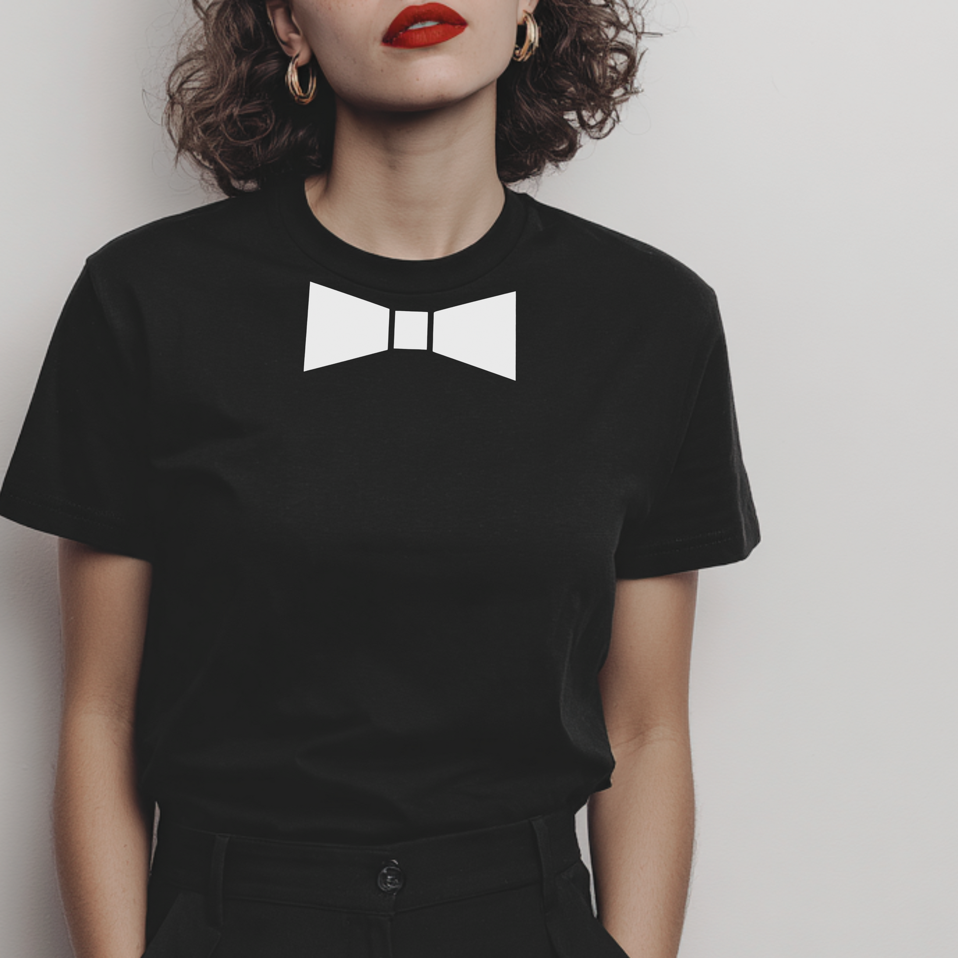 black t-shirt with a white bow tie graphic