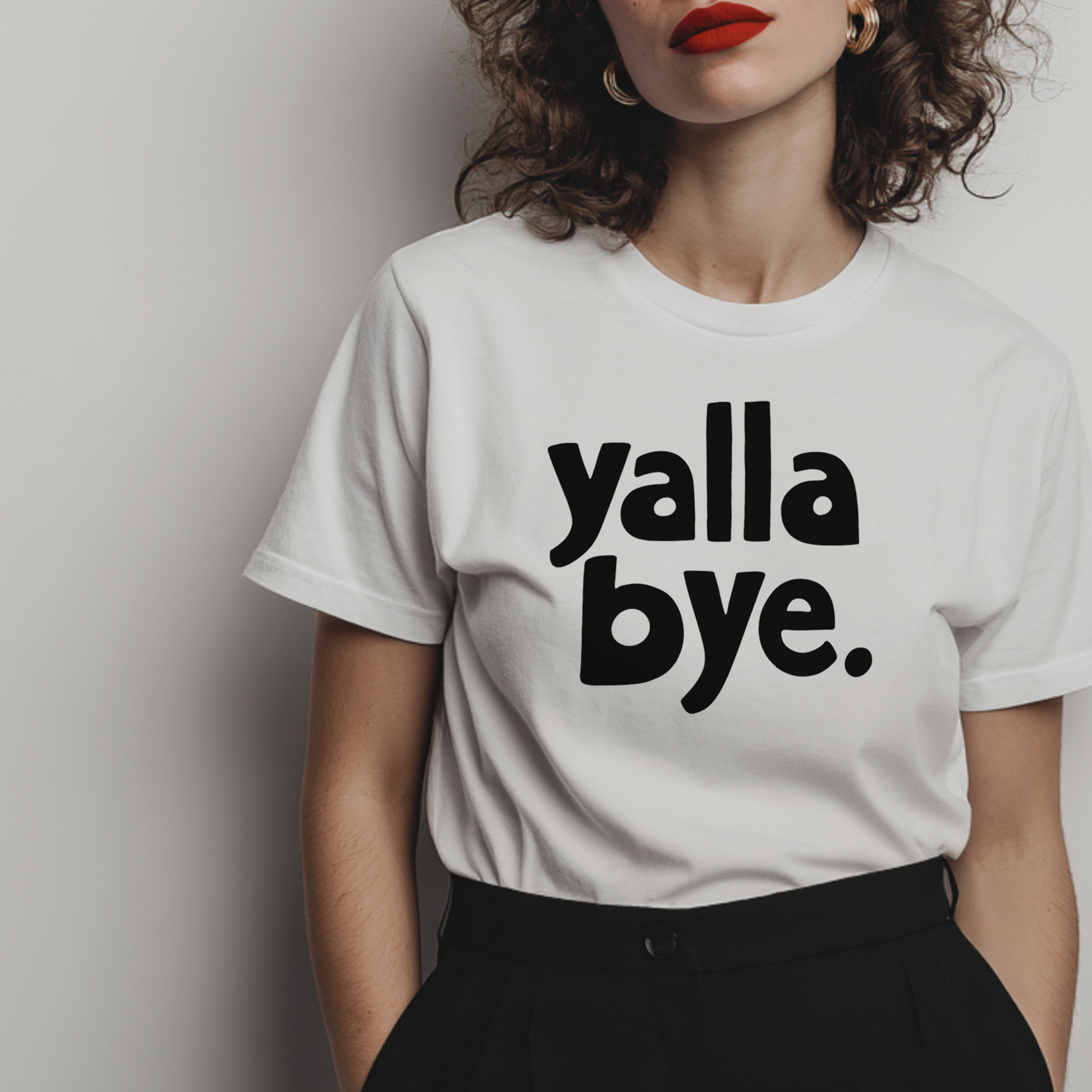white statement t-shirt for women with arabic quote 'yalla bye.' 